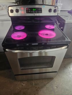 fridgedaire five burner stainless steel glass top electric stove.