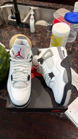 White cement Jordan 4s size 10