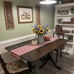 Restored Duncan Phyfe drop leaf table with two lyre back chairs