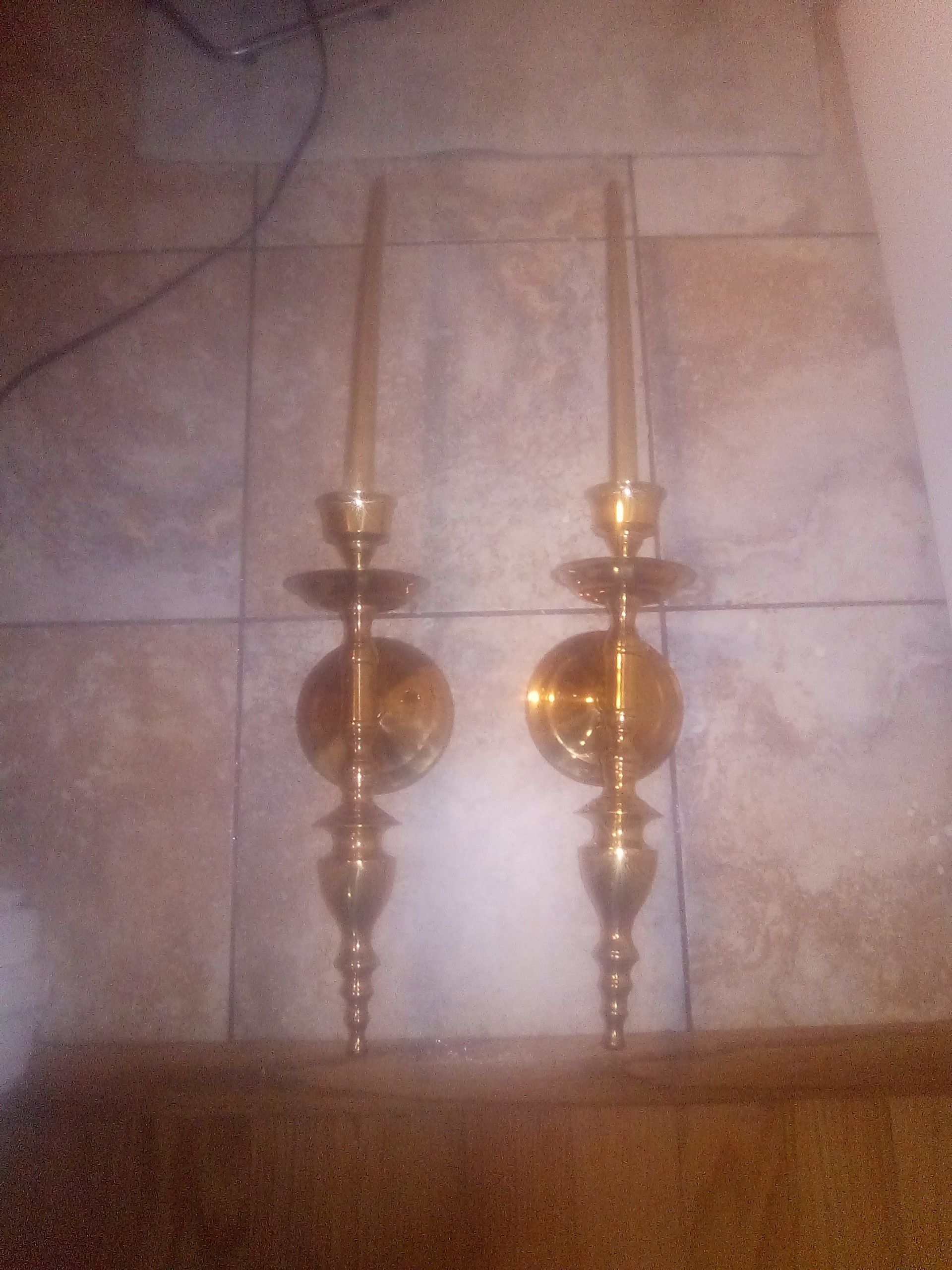 Two very large brass wall mount candle holders
