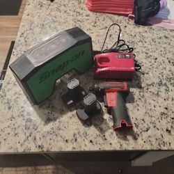 Snap on electric Screwdriver Bluetooth speaker 2 batteries and charger.
