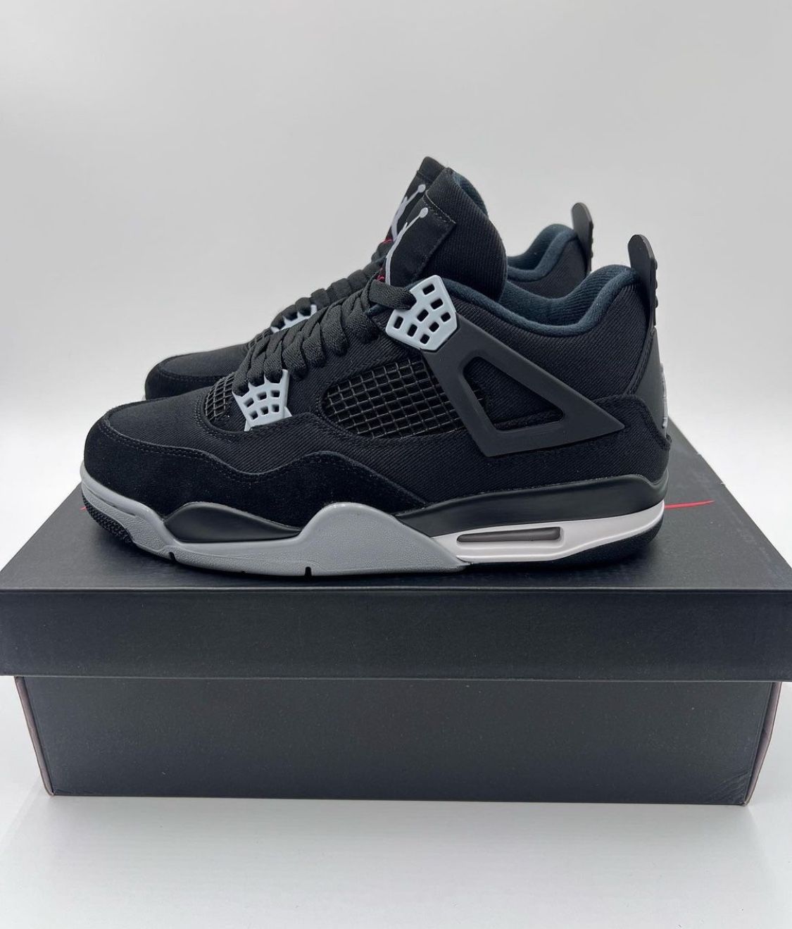 Black Canvas Jordan 4