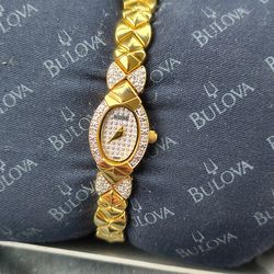 14 diamond's gold watch