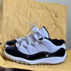 Authentic Jordan 11 Retro Low Le Baby/Toddler Shoe Size 9C  (White) & Black) Condition New 