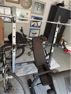 Weight lifting bench and leg curl.