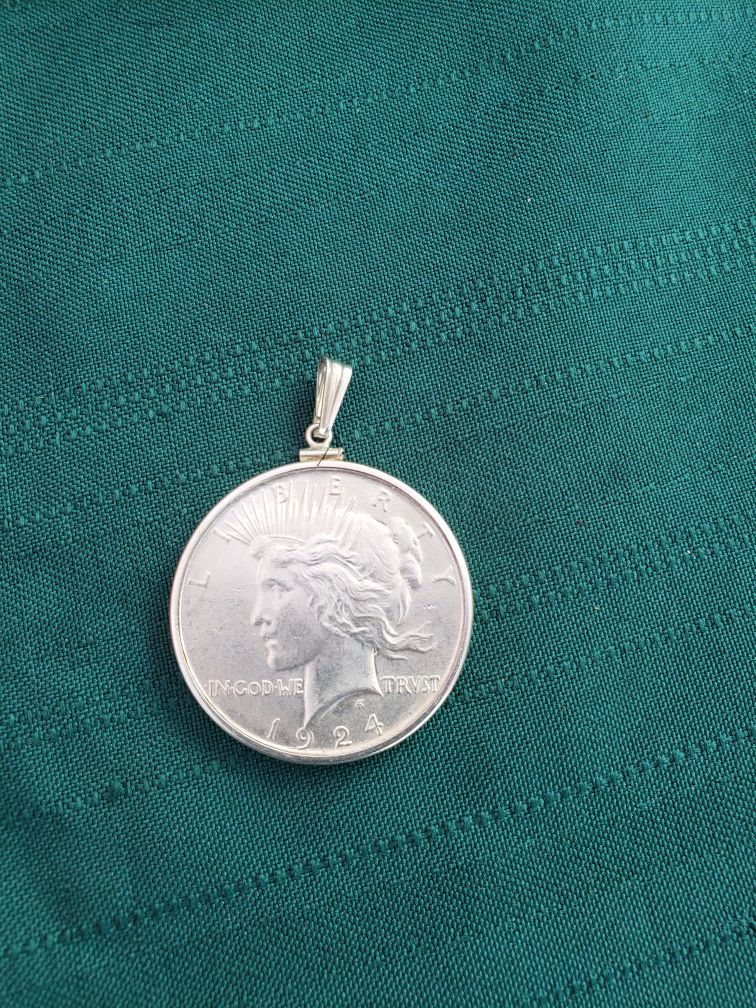 One dollar coin silver pendant