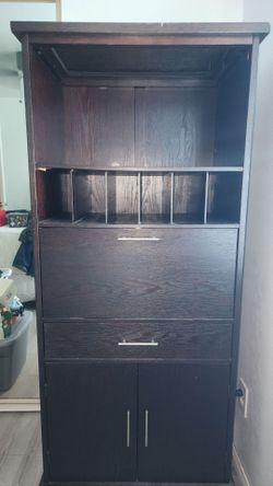 Brown dresser/wood cabinet w/ built-in surge protector