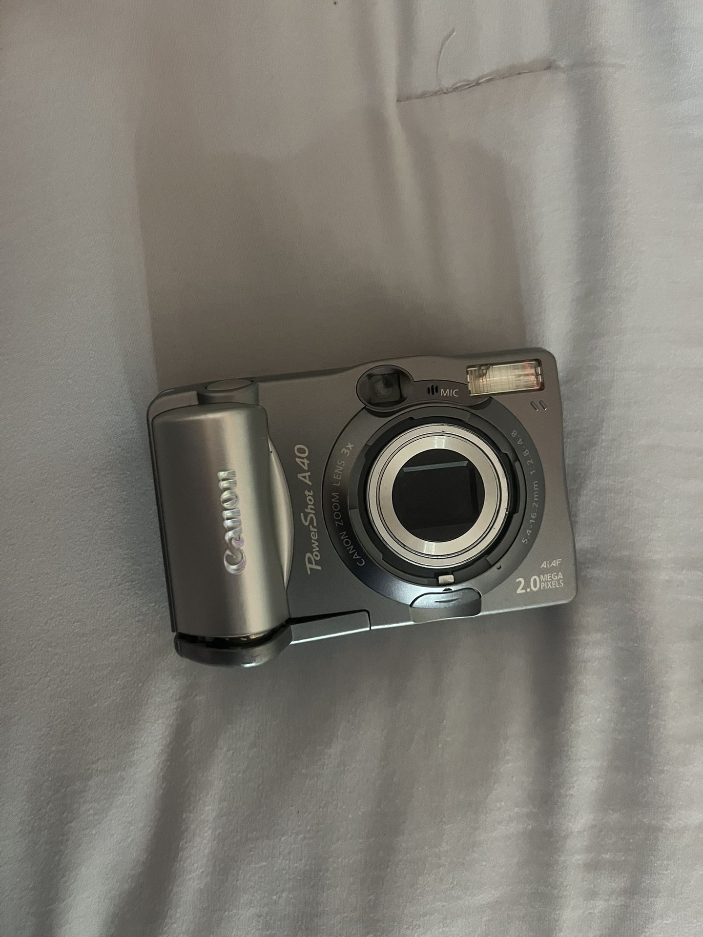 Silver Canon Powershot A40 digital camera with 10.2MP sensor, 4x zoom lens, and 2.0" screen camera #digitalphotography