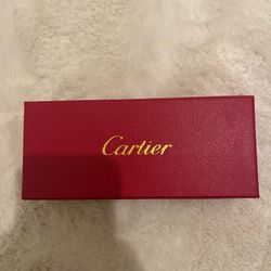 All black Cartier glasses black arms