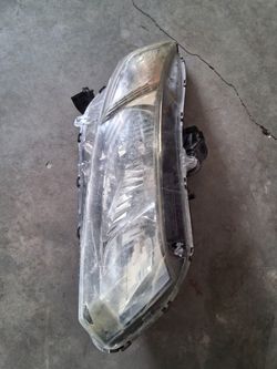 2012-2015 OEM passenger side headlight