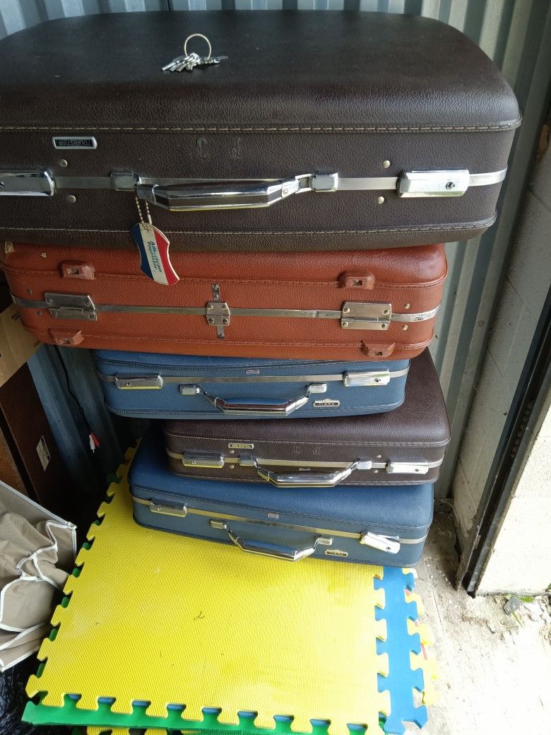 Old Fashioned Suitcases With The Keys