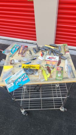 Assorted fishing baits hooks and metal Weights