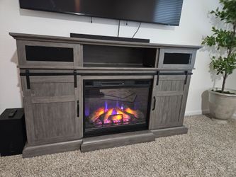 Fire place console with speakers