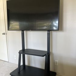 Samsung 55” Curved TV with Rolling TV Cart 