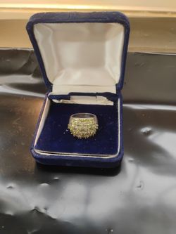 Sterling Silver Ring set with a Cluster of Peridot