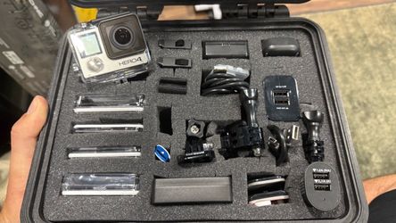 GoPro Hero 4 with Hard Case and Accessories