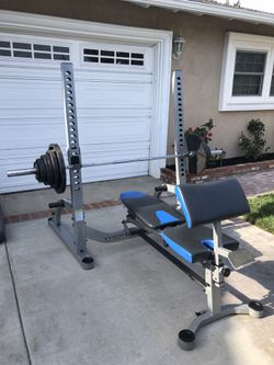 Nautilus Folding Olympic Bench with 249 Lbs Total Weights for Sale in Anaheim CA OfferUp
