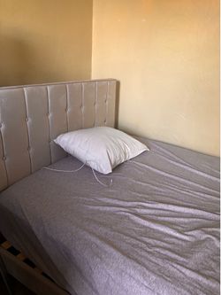 Beige full size bed frame with 10” mattress