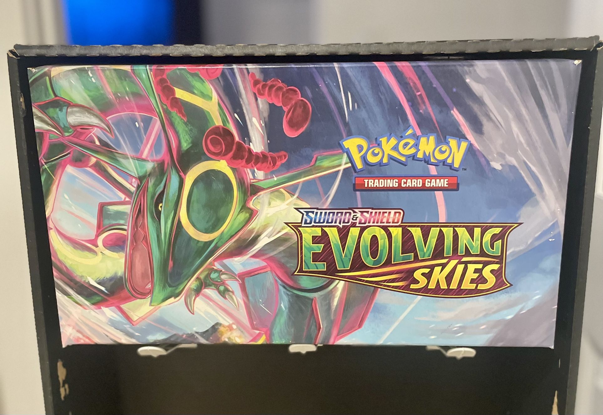 Authentic Evolving Skies • In Stores Hanging Display