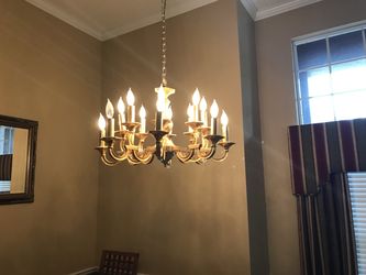 One heavy duty brass light fixture plus two same brand wall light fixture
