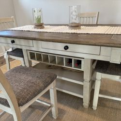 Dining Table and 4 Barstools from Ashley furniture