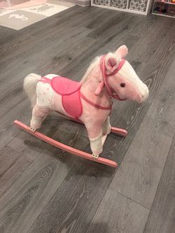 Pink plush rocking horse