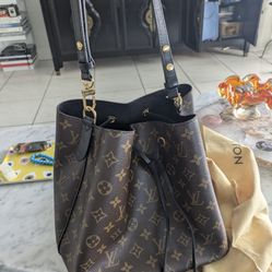 Louis Vuitton Bucket Purse 