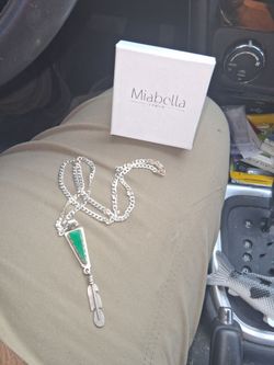 Sterling silver necklace and green turquoise pendant