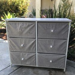 6 Drawer Fabric Dresser With A Metal Frame 