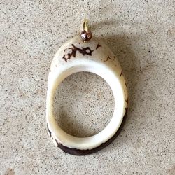 🤎 Interesting, new cream and brown tagua seed pendant with small copper colored bead