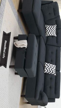 Black sectional with storage ottoman $999.99 or $40 down