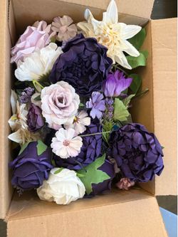 Box of flowers including metal stem