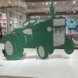 Metal Green Tractor Wall Decor. 27”L x 22”T.