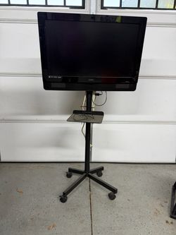 Vizio Flat Screen TV with Rolling Stand