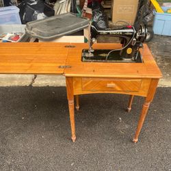 Singer Sewing Machine And Cabinet