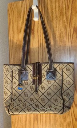 Dooney and Burke with interior stains