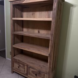 Brown wooden bookshelf with 2 shelves