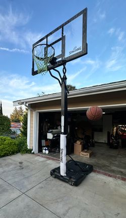 Spalding 60 In. Acrylic Screw Jack Portable Basketball Hoop