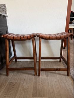 Pair of Mid-Century Modern Woven Leather Saddle Stools