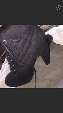 Pair of quilted black chunky-heeled suede shoes