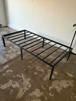Two twin metal bed frames