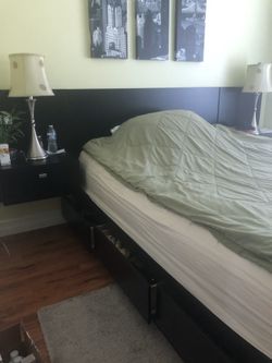 Queen bed with floating nightstands in black