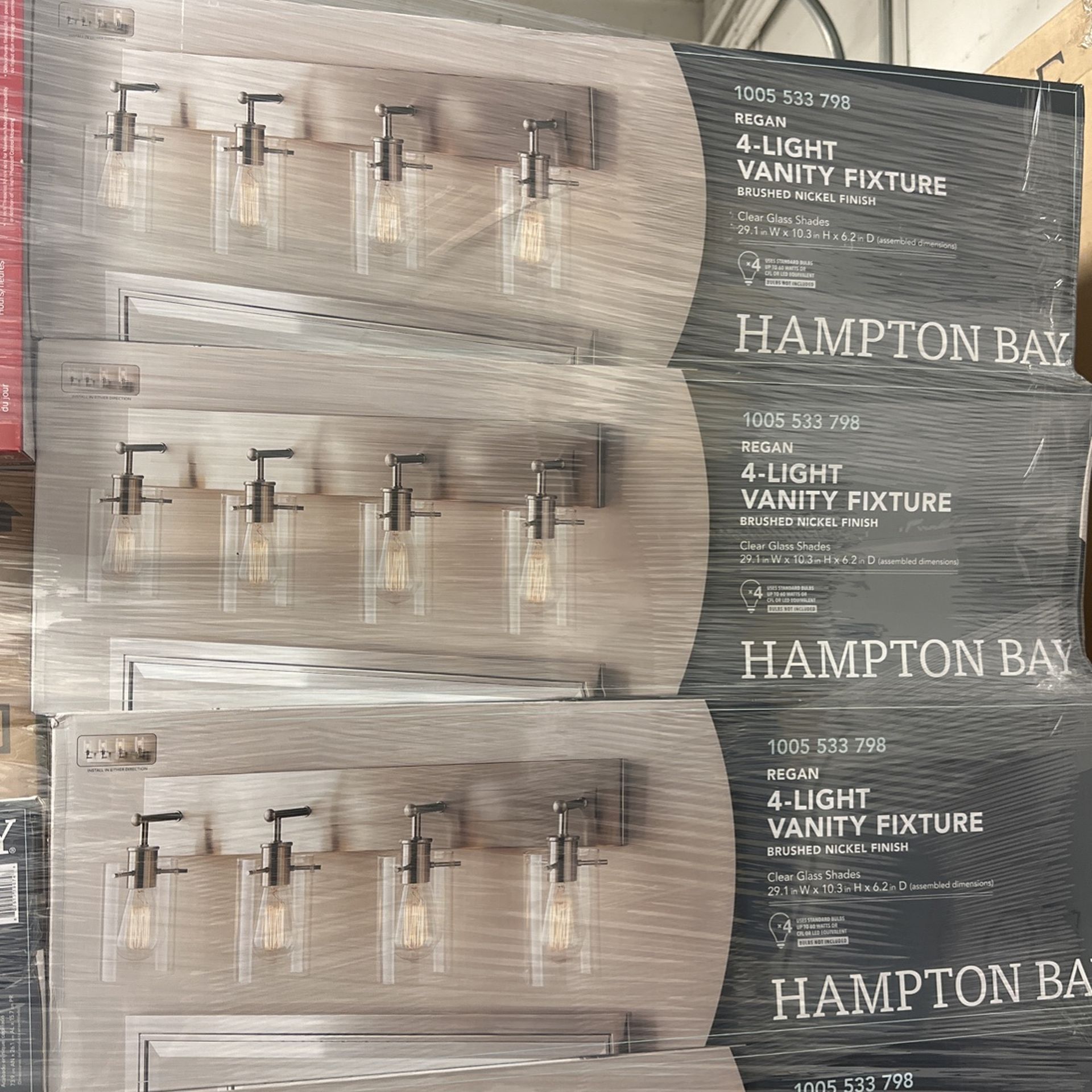 Hampton bay regan brushed nickel 2024 vanity light with clear glass shades