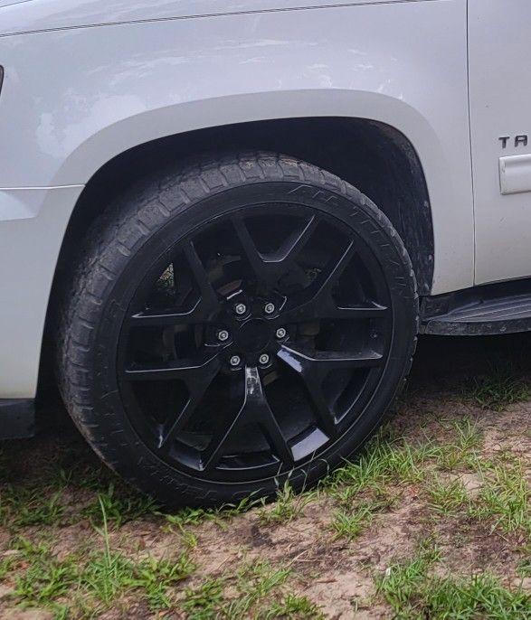 24" Black Rims With All Terrain Tires