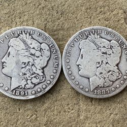 Morgan silver dollars (x2)(both Carson City)