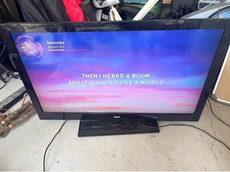 46 inch RCA flatscreen tv with stand, no remote.