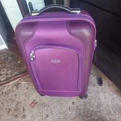 Price is firm.. legal size hardcover carry on swivel luggage
