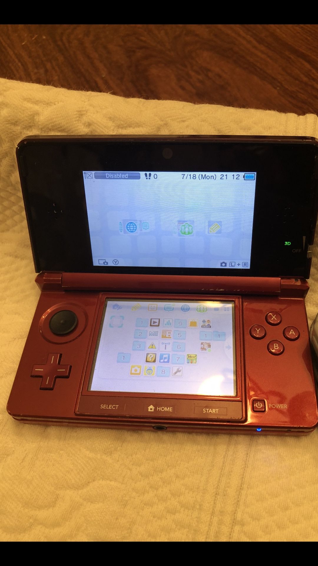 Black and red Nintendo 3ds