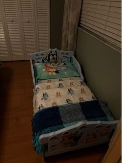 Two toddler Bluey beds w/ mattresses and matching bed sheets