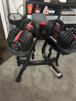 Like New Bowflex 552 adjustable dumbbells with media stand